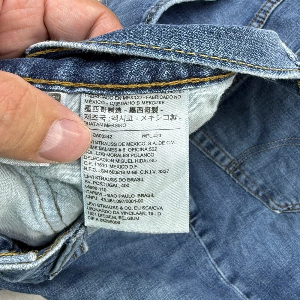 Levi's 502 Regular Taper Jeans Mens 36x34 Blue Denim Medium Wash Straight Casual